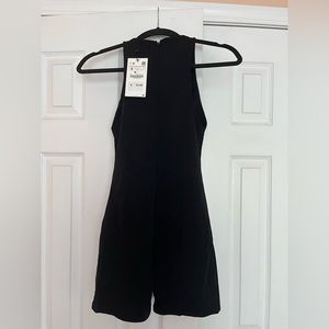 Never been worn black onesie